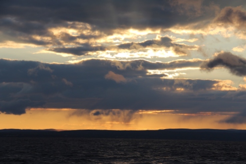 A cloudy sunset off the coast of Gaspésie. Credit Samantha McBeth